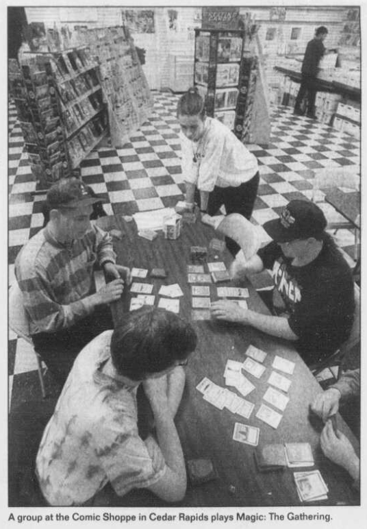 "The Comic Shoppe Plus" would later move across town and become just "Comic Shoppe."
It was featured here on a front page story by The Gazette (Sun., 02/19/1995) covering the explosive growth of MTG. That black & white checkered floor is seared into my memory.