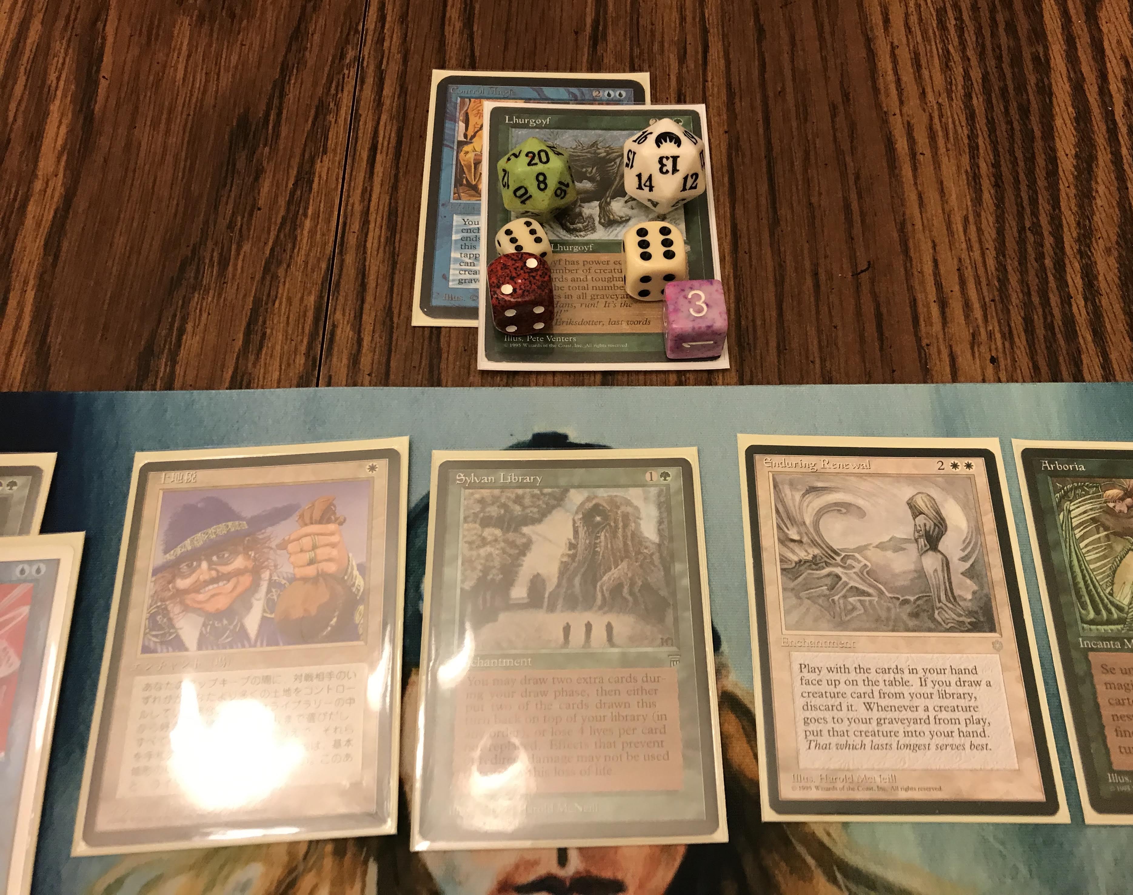 A massive Lhurgoyf prowls the battlefield in a game of OS95-EDH